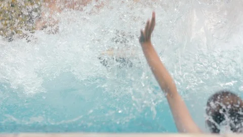 Friends jumping in swimming pool having fun celebrating summer vacation together Stock Footage 113229638