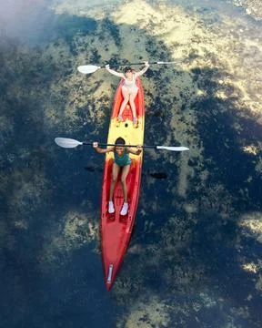 Friends kayak adventure, success and sport teamwork travel together outdoors Stock Photos