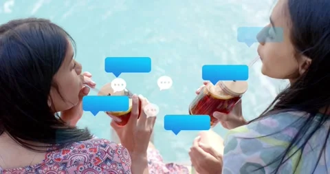 Friends lifting mason jars pool toasting iced tea sending chat bubbles between Stock Footage 318668343