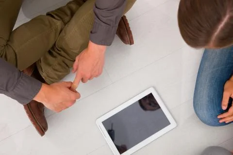 Friends looking digital tablet Foto stock