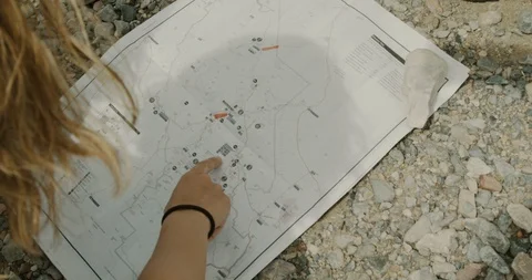 Friends looking on a map Stock Footage 114591237