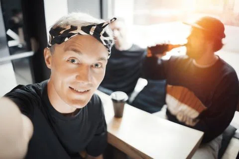 Friends make selfie while celebrating and having fun. Stock Photos