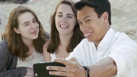 Friends making funny faces for selfie Stock Footage 78365826