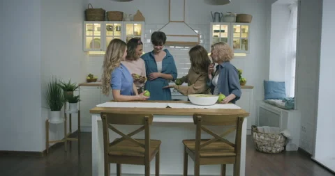Friends Meet at the Kitchen Stockbeeldmateriaal 144177863