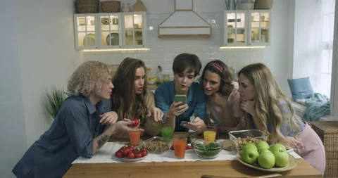 Friends Ordering Goods via Internet Stock Footage 144645001