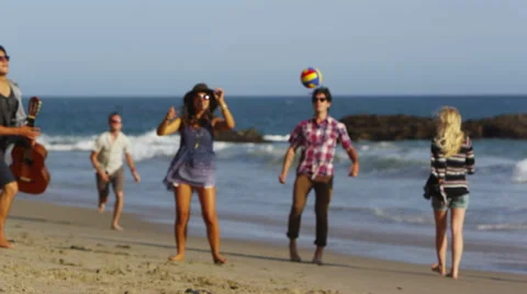 Friends playing by the beach Stock Footage 62345157