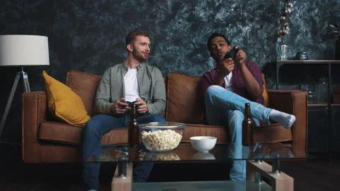 Friends Playing Console Games at Home. Friends at Couch. Gamers at Home. Indian Stock Footage 147163664