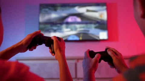 Friends playing console video game. Close-up of hands with game controller,.. Stock Footage 286104196