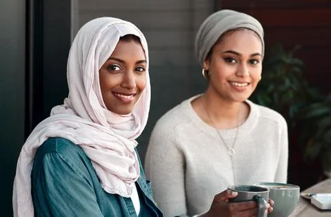 Friends, portrait and muslim with women in cafe for drink, food and social Stock Photos