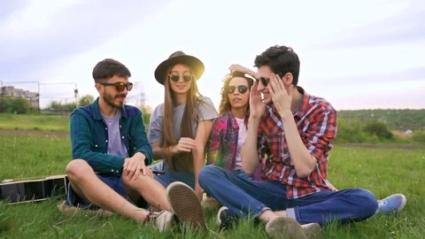 Friends put their hands together and throw them up. Team concept. Wide shot Stock Footage 75765782