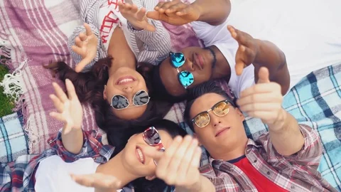 Friends reaching to the sun Stock Footage 127297355