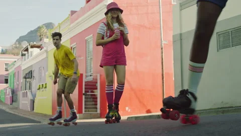 Friends Rollerskating on the Street Stock Footage 279377981