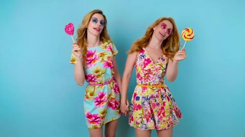 Friends sister dancing having fun, fashionable woman in floral dress excited rhy Vídeo Stock 245076302