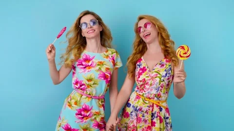 Friends sister dancing having fun, fashionable woman in floral dress excited rhy Video stock 246547711