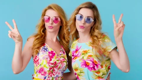 Friends sister dancing having fun, fashionable woman in floral dress excited rhy Video stock 246547865