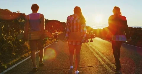 Friends Skateboarding at Sunset Stock Footage 81540727
