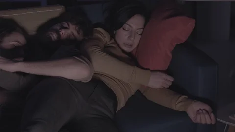 Friends sleeping on the couch Stock Footage 128779967