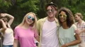 Friends smiling to camera, hugging and dancing to music at party, happiness HD Footage