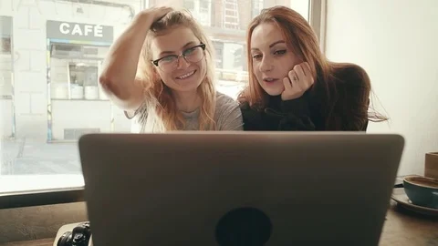 Friends spending time in cafe at midday Stock-Footage 82312787