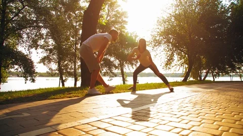 Friends stretching before running Stock Footage 104834395