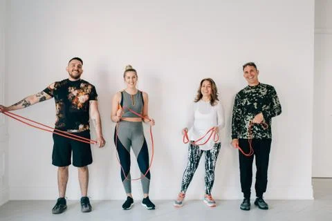 Friends taking break from workout in studio 스톡 사진