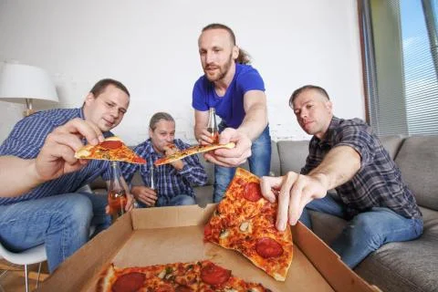 Friends taking pizza Stock Photos