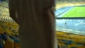 Friends taking seats at stadium, come before football match in advance, sports 4k or 4k+ Resolution