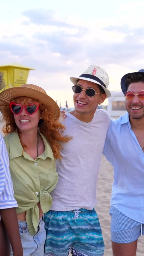 Friends taking selfie and walking on beach Stock Footage 310185635