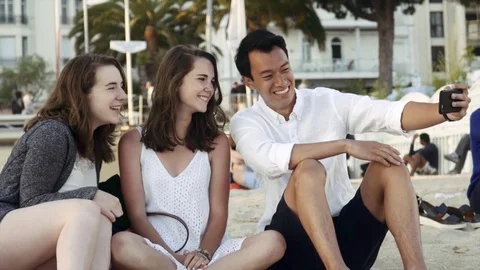 Friends taking a selfie on the beach Stock Footage 78366723