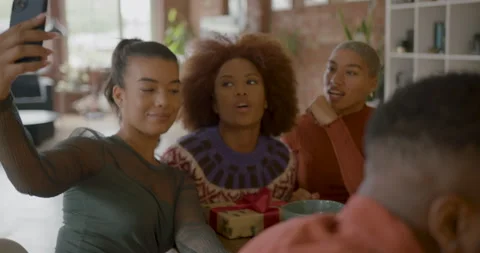 Friends Taking Selfie using Smart phone at Dinner Party Stock Footage 252835352