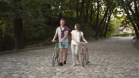 Friends Talk while Going Back Home Stockbeeldmateriaal 91795082