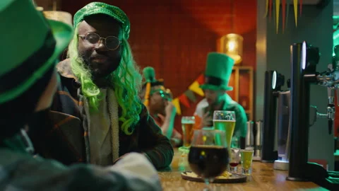 Friends Talking at Bar Counter on St Patricks Day Stock Footage 261512134