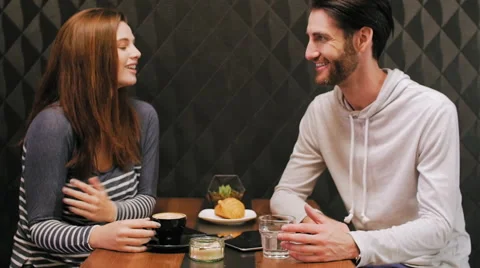 Friends talking in cafe Stock Footage 58125196