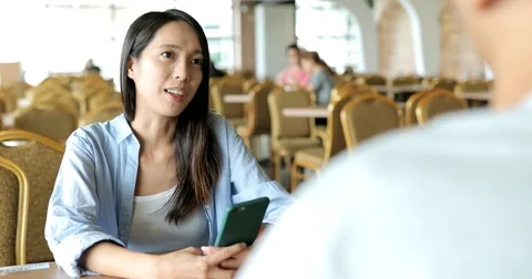 Friends talking restaurant Stock Footage