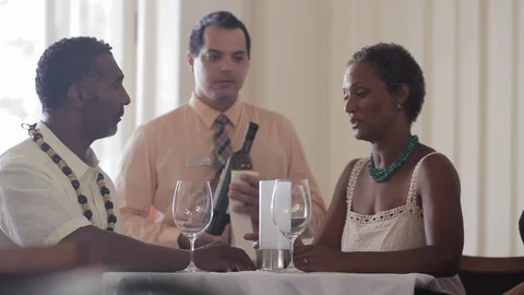 Friends talking in a restaurant. Video stock 88371372