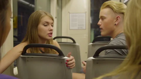 Friends talking on train trip Stock Footage 54261535
