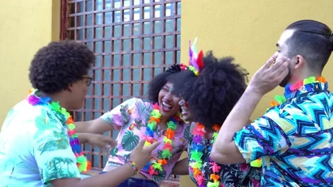 Friends talking while at the carnival in the street Stock Footage 229700678