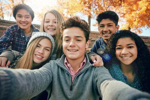 Friends, teenager and group selfie in the park, nature or fall trees and teens Stock Photos