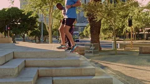 Friends training working out together in the city with sunflare Stock Footage 71625684