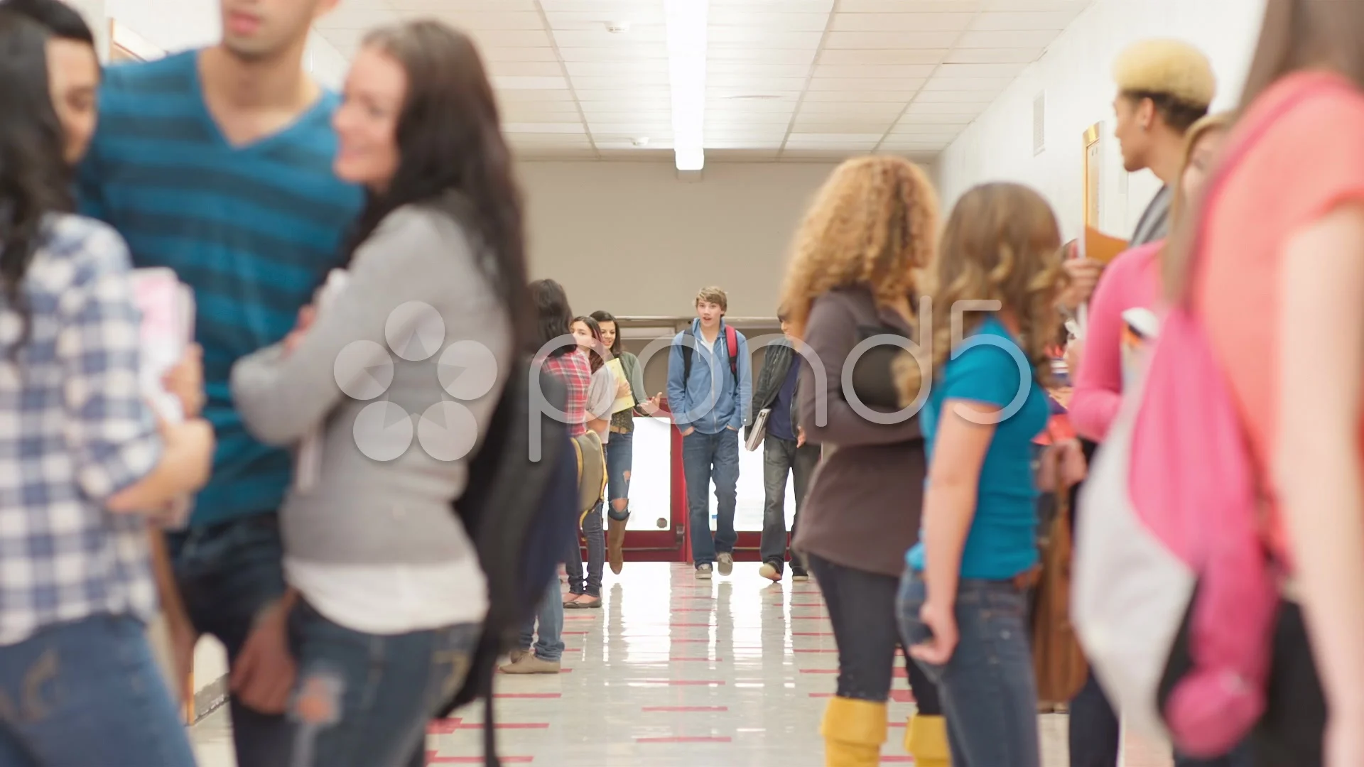 crowded high school hallway with kids