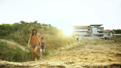 Friends walking on the beach Stock Footage 68797521