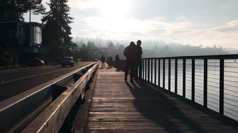 Friends walking by the water Stock Footage 144683849