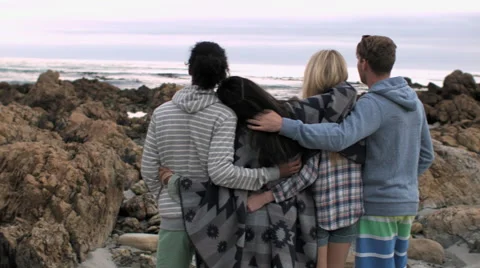 Friends watching sea waves Stock Footage 64563231