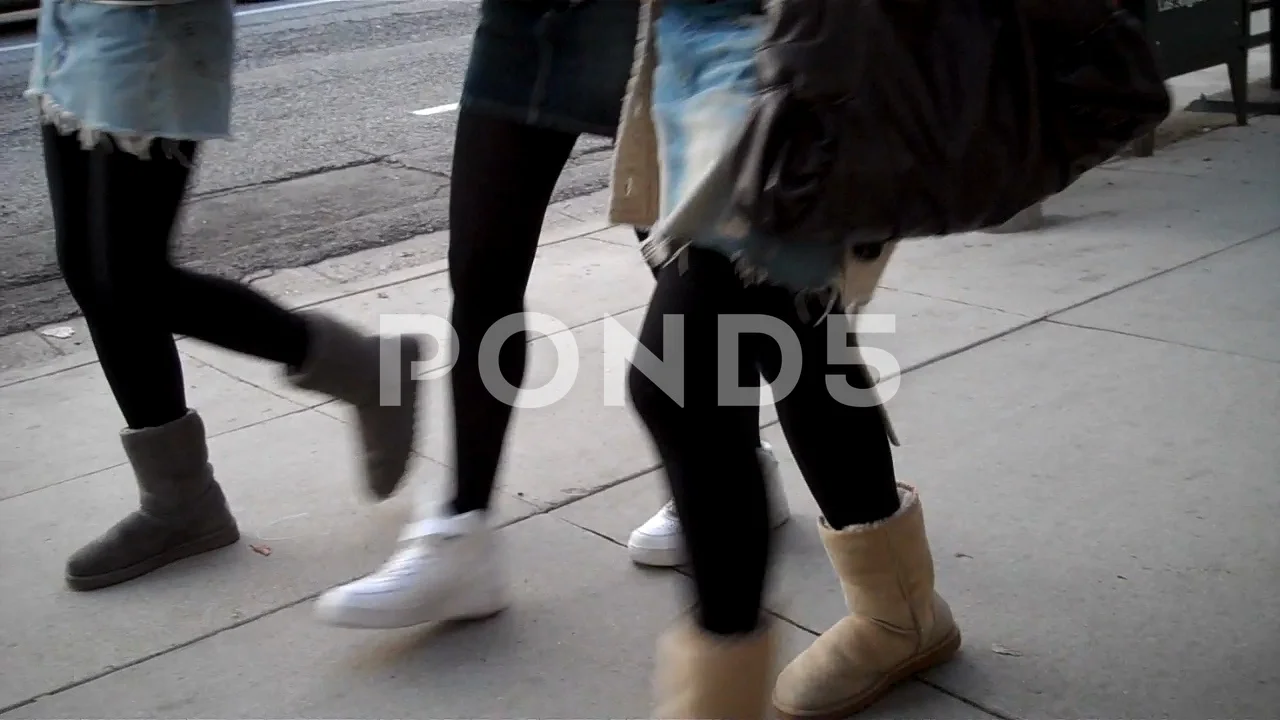 friends wearing ugg boots and tights, Stock Video