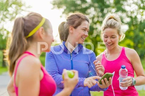 Friendship and fitness in the parc Stock Photos