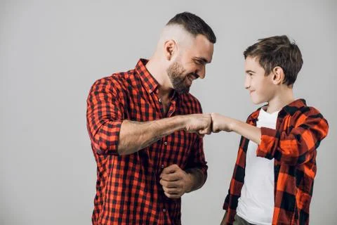 Friendship between daddy and son. arangement. it's ok. Stock Photos