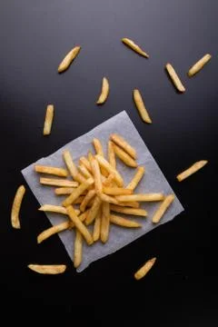 Fries on black table Stock Photos