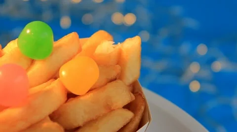 Fries - Blue Background - Turning - Focus - 05 Stock Footage 62389806
