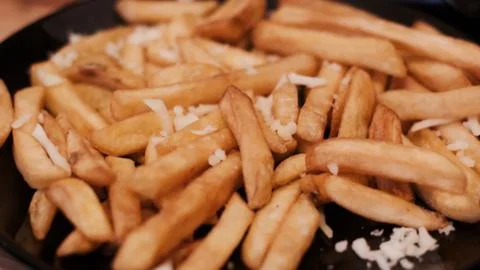 Fries with cheese Stock Photos