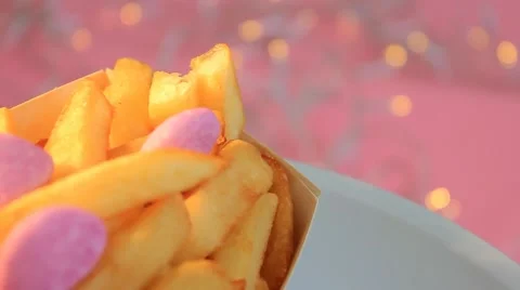 Fries - Pink Background - turning - Focus - 04 Stock Footage 62394616